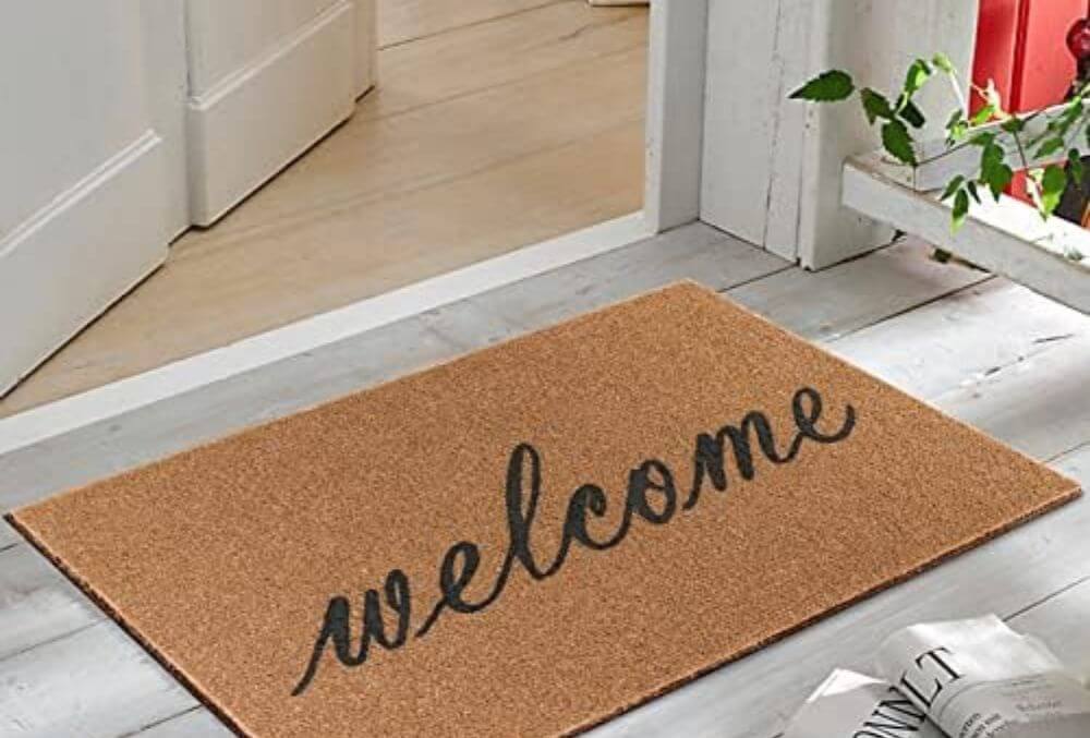 welcome cork mat outside the door