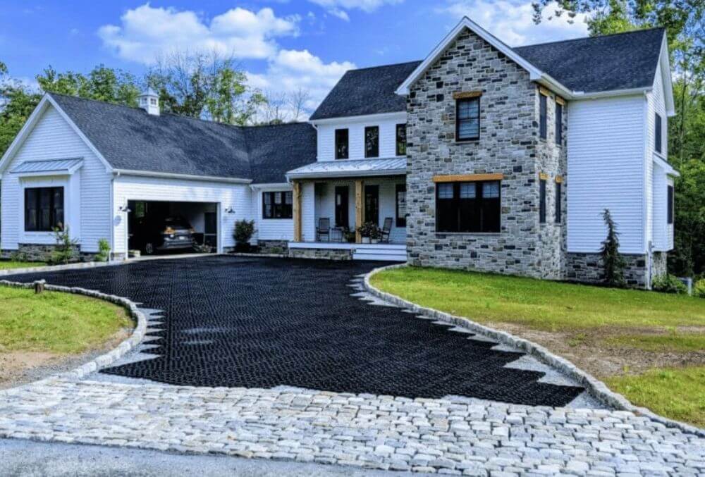 country house with gravel driveway