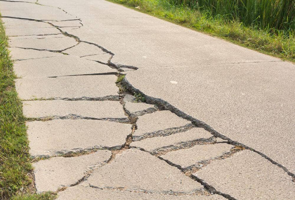 Evident cracks in a concrete driveway