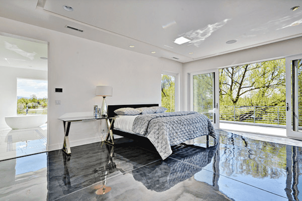 luxurious bedroom with king bed and sliding door