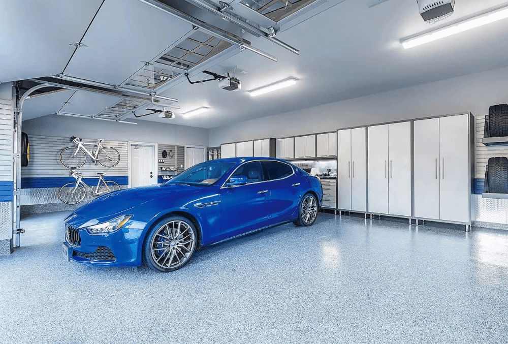 blue car inside the garage