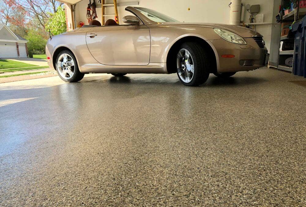 Chipped epoxy floor in a residential garage