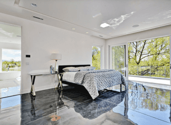 luxurious bedroom with king bed and sliding door