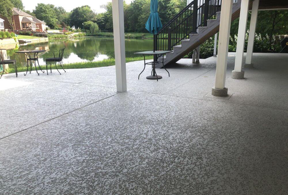 Patio facing a river with classic texture coating