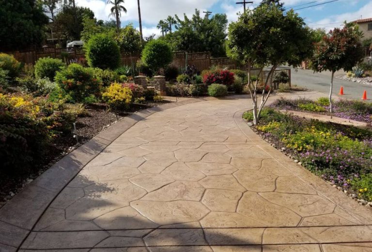 Stamped concrete driveway with brown stain