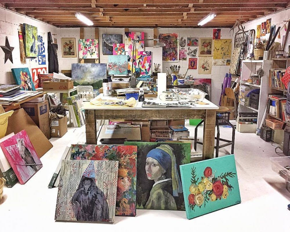 paintings in basement turned into artist man cave