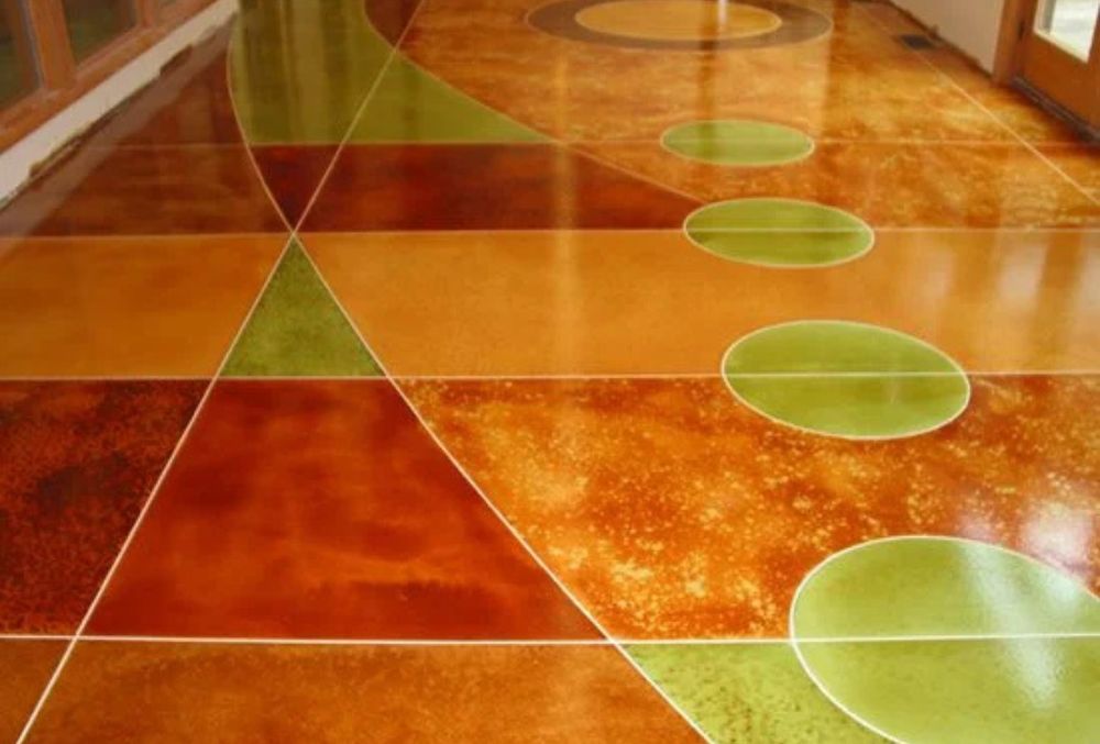 Decorative colored concrete flooring featuring a seamless surface and vibrant tone for a stylish, low-maintenance design.