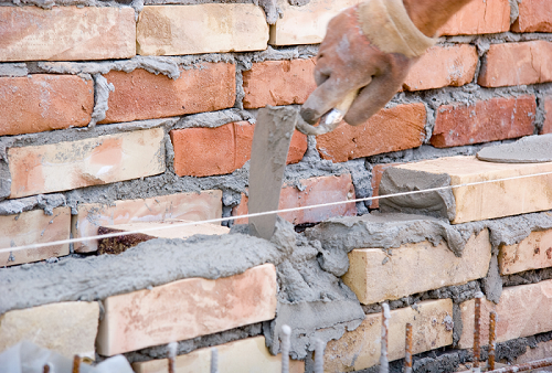 Aligning brick installation using masonry liners
