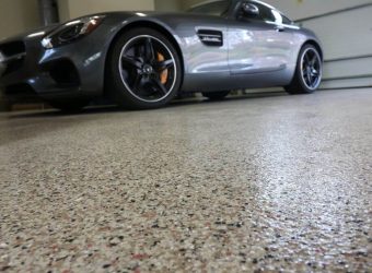 car parked on the garage floor coatings