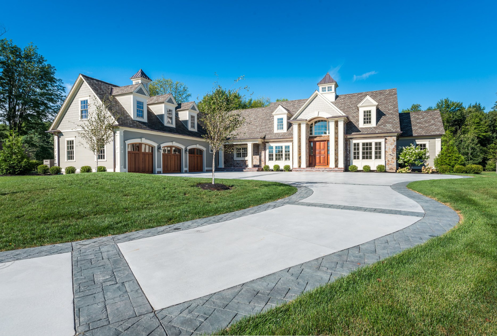 concrete driveway with stone border