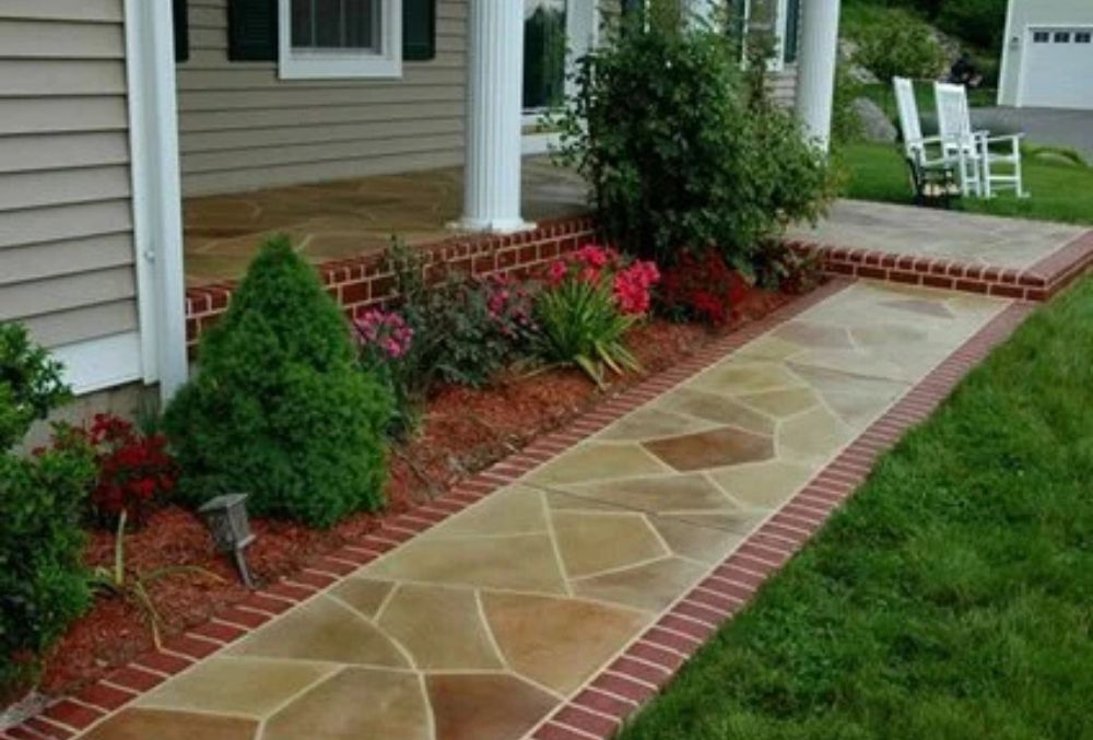 Durable colored concrete walkway featuring a clean, modern look for residential or commercial use.