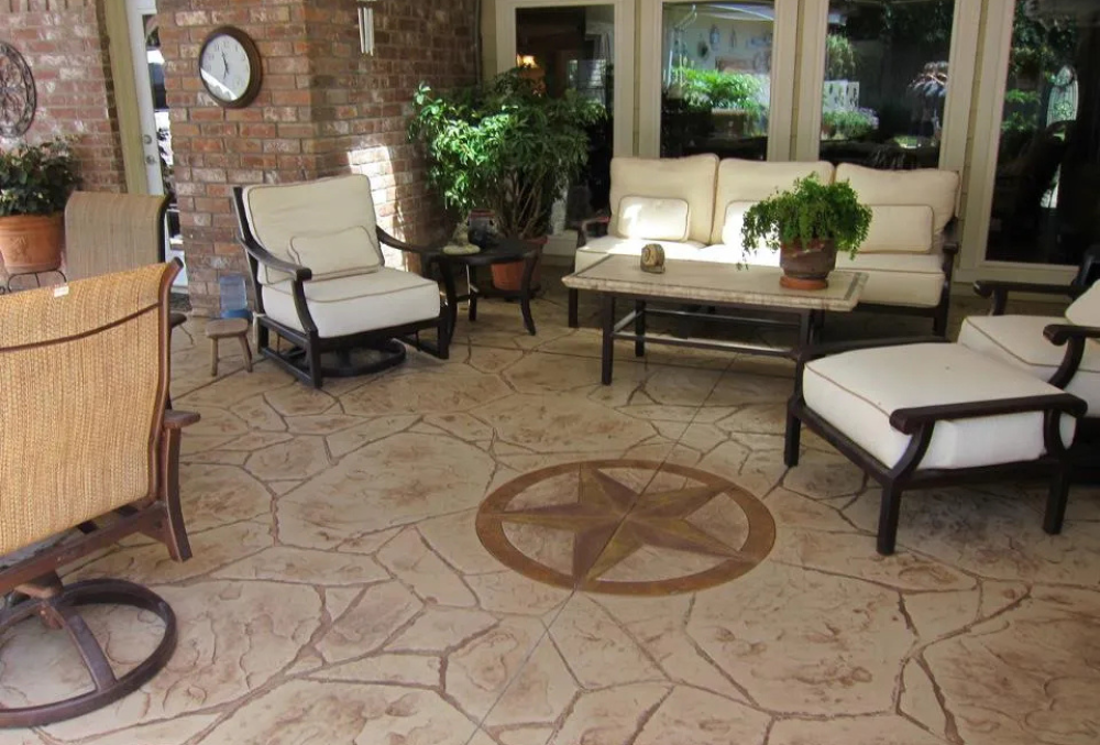 stamped concrete patio with logo